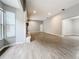 Spacious living room featuring a fireplace and large windows at 2358 Havana Dr, Clearwater, FL 33764