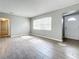Bright living room with wood-look tile floors and plenty of natural light at 2358 Havana Dr, Clearwater, FL 33764