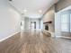 Sunlit living room with tile floors and a fireplace at 2358 Havana Dr, Clearwater, FL 33764