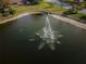 Water fountain in a serene community lake at 4993 Bostonian Loop # 4993, New Port Richey, FL 34655