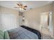 This bedroom features closet space and an ensuite bathroom at 8916 Arabella Ln, Seminole, FL 33777