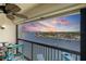 Balcony boasting stunning sunset and waterfront views at 9415 Blind Pass Rd # 905, St Pete Beach, FL 33706