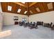 Community room with tables and chairs, perfect for gatherings at 9415 Blind Pass Rd # 905, St Pete Beach, FL 33706