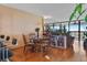 Dining area with rattan table set with views at 9415 Blind Pass Rd # 905, St Pete Beach, FL 33706