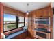 Kitchen with built-in window seat and double oven at 9415 Blind Pass Rd # 905, St Pete Beach, FL 33706