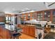 Modern kitchen with granite countertops and stainless steel appliances at 9415 Blind Pass Rd # 905, St Pete Beach, FL 33706