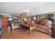 Spacious living room featuring a large sofa and stylish decor at 9415 Blind Pass Rd # 905, St Pete Beach, FL 33706