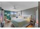 Main bedroom with king-size bed, and water view at 9415 Blind Pass Rd # 905, St Pete Beach, FL 33706