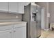 Stainless steel refrigerator in a well-lit kitchen at 12028 Timberhill Dr, Riverview, FL 33569