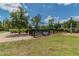 Fenced dog park with bench and grassy area at 12926 Payton St, Odessa, FL 33556