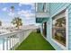 Deck with artificial turf and water views at 15421 2Nd E St, Madeira Beach, FL 33708