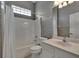 Clean bathroom with a tub shower combination and vanity at 2217 Platinum Dr, Sun City Center, FL 33573