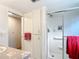 Bathroom with shower, vanity, and ample storage at 2331 Belleair Rd # 116, Clearwater, FL 33764