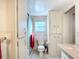 Clean bathroom with shower, toilet, and vanity at 2331 Belleair Rd # 116, Clearwater, FL 33764