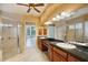 Bathroom with double vanity, large shower and access to the bedroom at 3921 Mimosa Pl, Palm Harbor, FL 34685