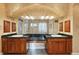 Double vanity bathroom with granite countertop at 3921 Mimosa Pl, Palm Harbor, FL 34685