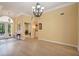 Spacious entryway with hardwood floors and views to other rooms at 3921 Mimosa Pl, Palm Harbor, FL 34685