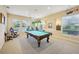 Game room with pool table and barber chairs at 3921 Mimosa Pl, Palm Harbor, FL 34685