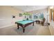 Game room featuring a pool table and comfortable seating at 3921 Mimosa Pl, Palm Harbor, FL 34685