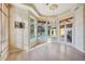 Bright Gathering room features hardwood floors and a view of the pool at 3921 Mimosa Pl, Palm Harbor, FL 34685