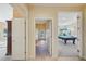 Hallway view of bathroom and game room at 3921 Mimosa Pl, Palm Harbor, FL 34685