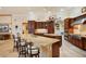 Gourmet kitchen with granite countertops and custom cabinetry at 3921 Mimosa Pl, Palm Harbor, FL 34685