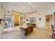 Bright living room with fireplace, large windows, and comfortable seating at 3921 Mimosa Pl, Palm Harbor, FL 34685