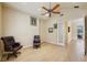 Bright office features hardwood floors and built-in shelving at 3921 Mimosa Pl, Palm Harbor, FL 34685