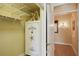 Storage room with shelves and a large safe at 3921 Mimosa Pl, Palm Harbor, FL 34685