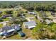 Aerial view showing home's location in a quiet neighborhood at 5592 Fairway Dr, Ridge Manor, FL 33523