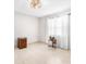 Empty bedroom with tile flooring and large window at 5592 Fairway Dr, Ridge Manor, FL 33523