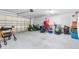 Spacious garage with ample room for storage and vehicles at 5592 Fairway Dr, Ridge Manor, FL 33523