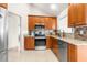 Modern kitchen with granite countertops and stainless steel appliances at 5592 Fairway Dr, Ridge Manor, FL 33523