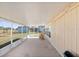 Spacious screened porch overlooking the backyard at 5592 Fairway Dr, Ridge Manor, FL 33523