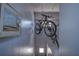 Upper level hallway with hanging bike storage at 9521 86Th Ave # 9521, Seminole, FL 33777