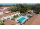 Aerial view of a community pool and surrounding townhouses at 2302 Maki Rd # 5, Plant City, FL 33563