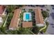 Aerial view of a community pool and surrounding buildings at 2302 Maki Rd # 5, Plant City, FL 33563