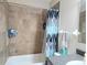 Updated bathroom with tub shower and modern vanity at 2302 Maki Rd # 5, Plant City, FL 33563