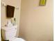 Small bathroom with toilet and wall mounted towel rack at 2302 Maki Rd # 5, Plant City, FL 33563