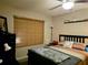Bright bedroom featuring a full-size bed and window at 2302 Maki Rd # 5, Plant City, FL 33563