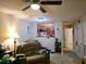 Living room with open concept to kitchen at 2302 Maki Rd # 5, Plant City, FL 33563