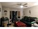 Living room with Christmas tree, sofa, and decorative accents at 2302 Maki Rd # 5, Plant City, FL 33563