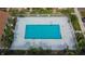 Community pool with surrounding fence and patio at 2302 Maki Rd # 5, Plant City, FL 33563