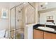 Modern bathroom with a walk-in shower and updated fixtures at 102 S Moody Ave # 3, Tampa, FL 33609