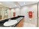 Bathroom with single sink, dark countertop, and modern fixtures at 102 S Moody Ave # 3, Tampa, FL 33609