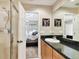 Stylish bathroom with a single sink and walk in shower at 102 S Moody Ave # 3, Tampa, FL 33609
