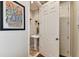 Small powder room with pedestal sink and neutral color scheme at 102 S Moody Ave # 3, Tampa, FL 33609