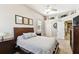 Bright bedroom with double bed, ceiling fan, and ample closet space at 102 S Moody Ave # 3, Tampa, FL 33609