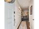 Light and airy entryway with hardwood floors and neutral walls at 102 S Moody Ave # 3, Tampa, FL 33609