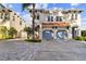Two-story house with a two-car garage and a paved driveway at 102 S Moody Ave # 3, Tampa, FL 33609